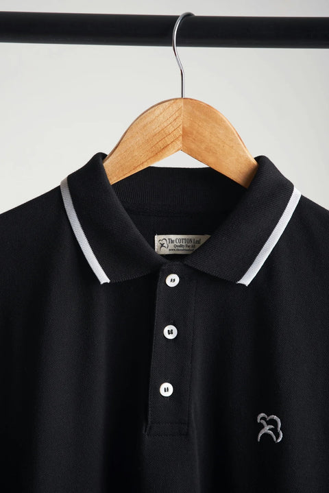 refined black vogue pique polo shirt for casual outfits