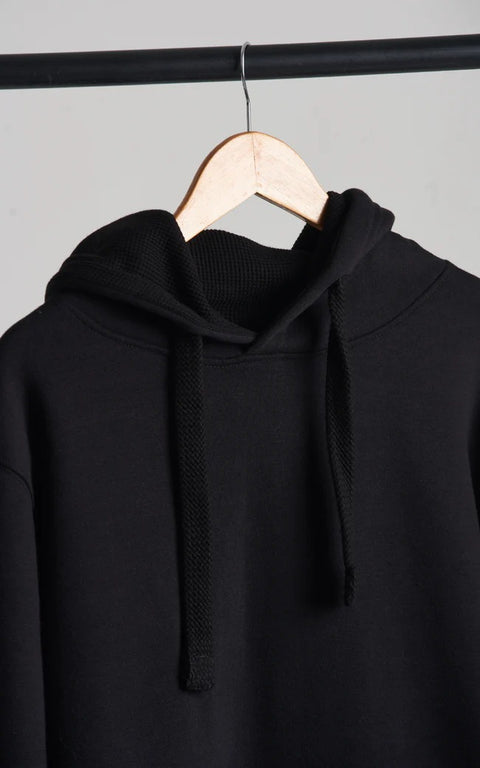 side view of unisex black plain hoodie shop now